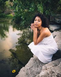 Woman sitting in a lake