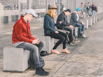 People sitting in a city