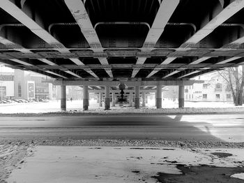 Low angle view of bridge in city