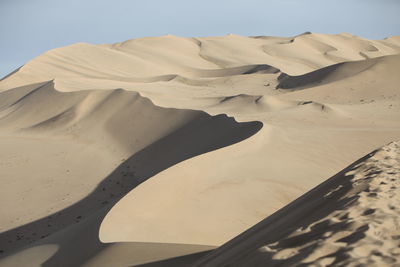 Scenic view of desert against sky