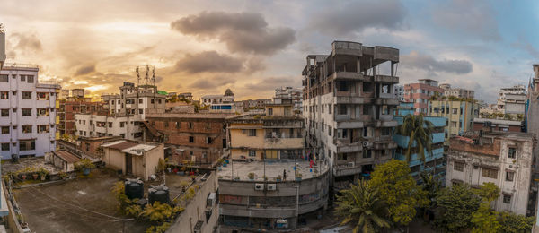 High angle view of buildings in city against sky