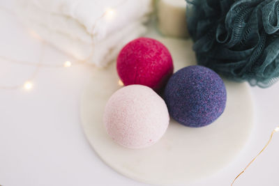 Close-up of christmas decorations on white background