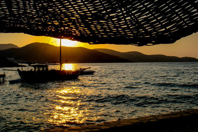 Scenic view of sea at sunset