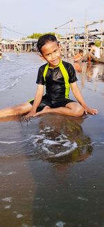 Portrait of smiling boy in water