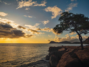 Scenic view of sea against sky during sunset