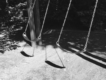 View of empty swings in playground
