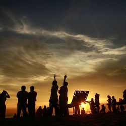 Tourists at sunset