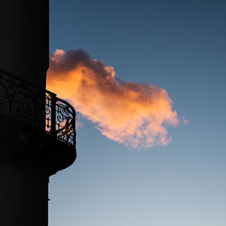 Low angle view of silhouette building against sky during sunset