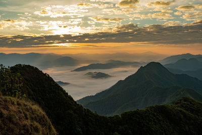 Scenic view of mountains against sky during sunset