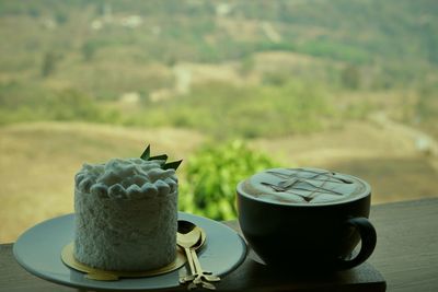 Close-up of coffee cup on table