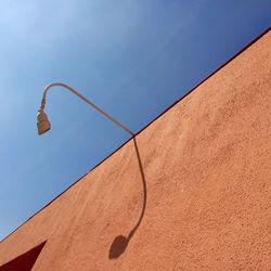 Low angle view of building against blue sky