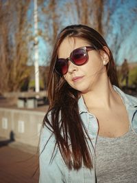 Portrait of young woman wearing sunglasses