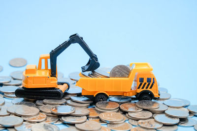 Close-up of machine against blue sky