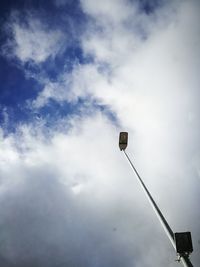 Low angle view of street light against sky