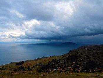 Scenic view of sea against cloudy sky