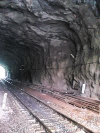 Railroad tracks in tunnel