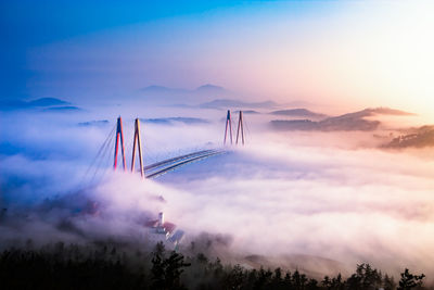 Bridge against sky during sunset