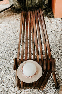 High angle view of abandoned bench on table