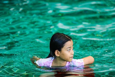 Portrait of a girl in swimming pool