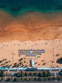 Scenic view of beach against sky during sunset