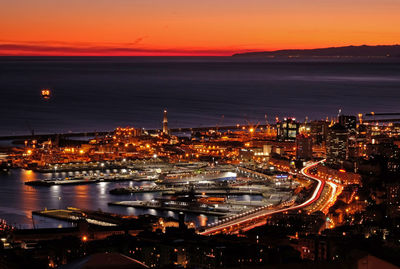 High angle view of illuminated city at night