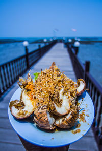 Close-up of crab in plate on table