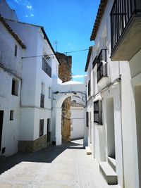 Narrow alley amidst buildings in town