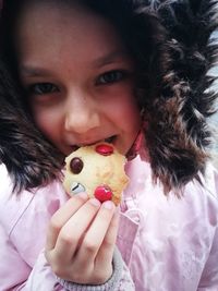 Portrait of happy woman eating ice cream