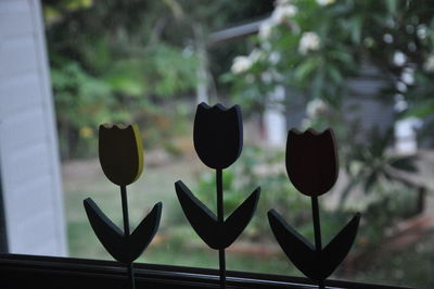 Close-up of heart shape on window