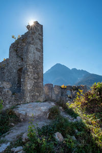 Old ruins of building against sky