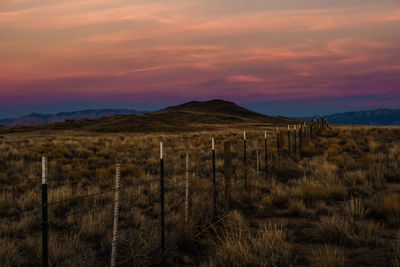 Scenic view of dramatic sky over landscape