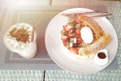 High angle view of breakfast served on table