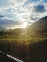 Scenic view of landscape against sky during sunset