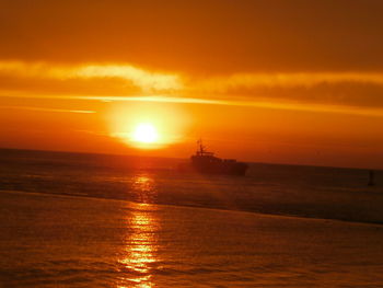 Scenic view of sea at sunset