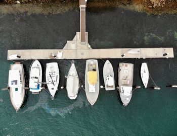 Directly above shot of boats moored on sea