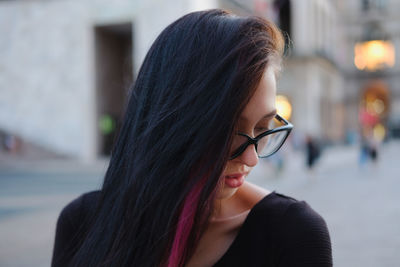 Close-up of young woman with long hair