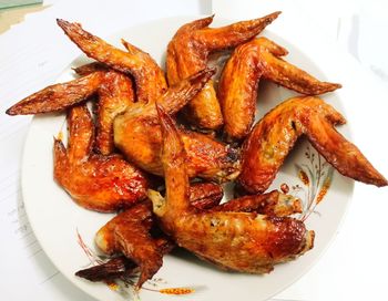 High angle view of meat in plate on table