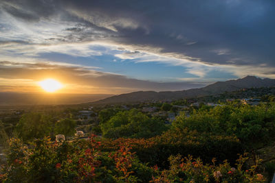 Scenic view of landscape against sky during sunset