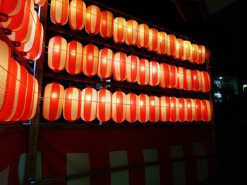 Illuminated lanterns hanging at night