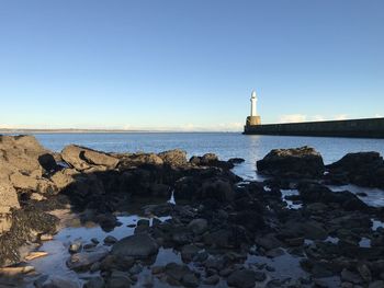 View of lighthouse at seaside