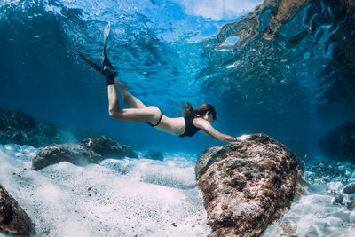 Man swimming in sea