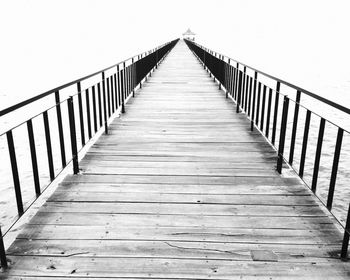 Wooden bridge over river