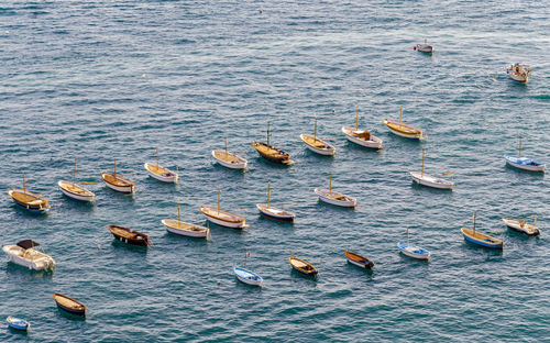 High angle view of boats moored in sea