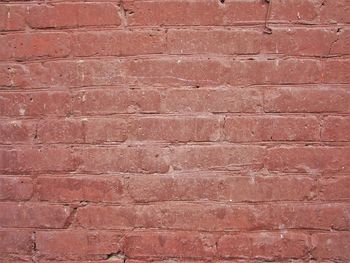 Full frame shot of red brick wall