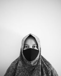 Portrait of man against white background