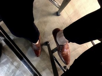 Low section of people standing on floor