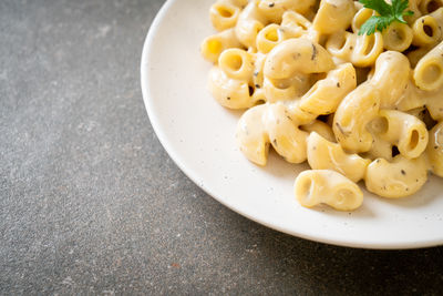 Close-up of pasta in plate on table