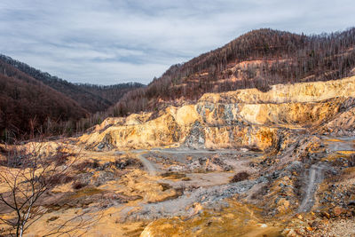 Old abandoned copper and gold surface mine in apuseni mountains, romania