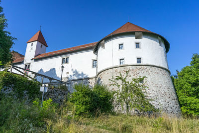 Low angle view of old building against sky