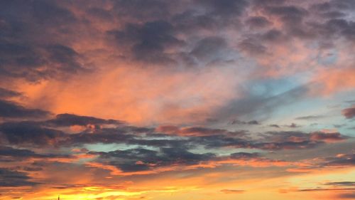 Low angle view of dramatic sky during sunset